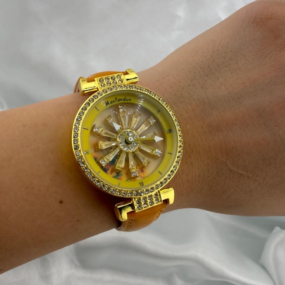 Anthropologie Gold and Yellow Sunburst Women's Watch